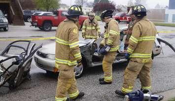 Firefighters show students the Jaws Of Life during Sarnia-Lambton's annual Emergency Preparedness Day held at Clearwater Arena. May 2017. (Photo by Jake Jeffrey)