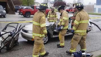 Firefighters show students the Jaws Of Life during Sarnia-Lambton's annual Emergency Preparedness Day held at Clearwater Arena. May 2017. (Photo by Jake Jeffrey)