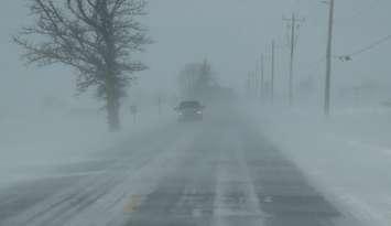 A snowy winter road (Sarnia News Today file photo)