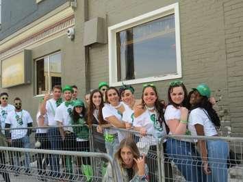 A group of St. Patrick's Day revellers lined up outside of The Ceeps on Richmond Row, March 17, 2017. (Photo by Miranda Chant, Blackburn News.)