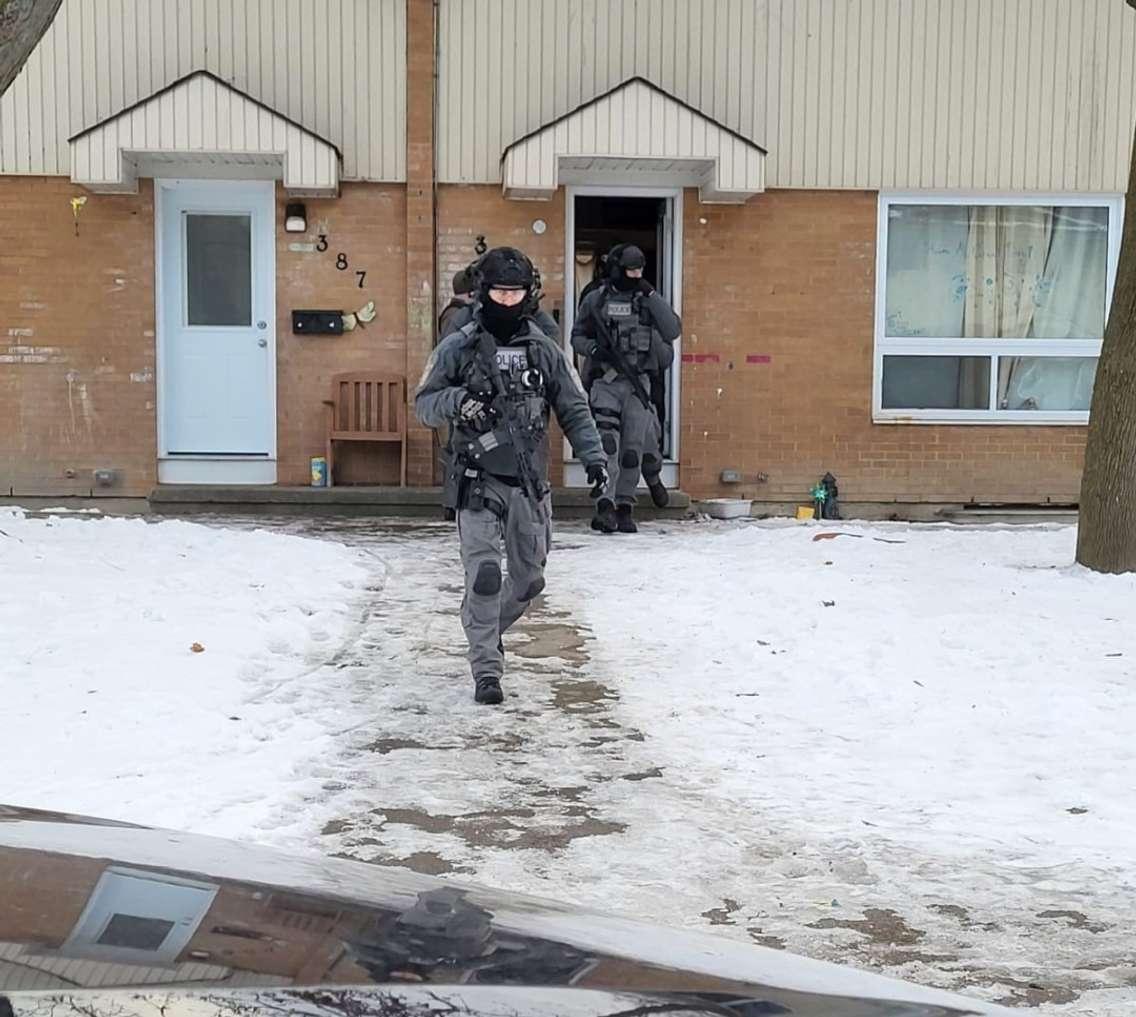 Police executing a search warrant on Kathleen Ave (Image courtesy of the Sarnia Police Service)