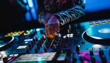PIC: DJ/Music table. Photo by deskcomm. iStock/Getty Images Plus.