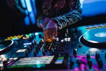 PIC: DJ/Music table. Photo by deskcomm. iStock/Getty Images Plus.