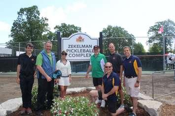 Tecumseh Mayor Gary McNamara, in green shirt, Windsor-Tecumseh MPP-elect Andrew Dowie, left, and members of Town Council open the Zekelman Pickleball Complex at Lacasse Park, June 9, 2022. Photo courtesy Town of Tecumseh.
