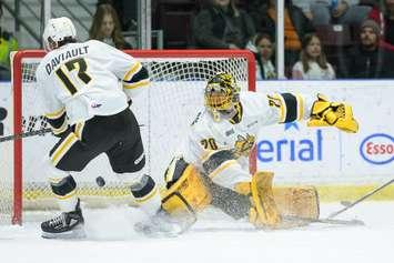 Sarnia Sting goaltender Ben Gaudreau makes a save in a game against the Flint Firebirds. 6 November 2022. (Metcalfe Photography)