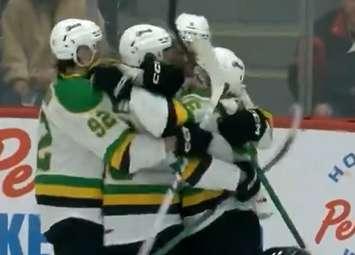 Knights players hug after Sam O’Reilly scores a goal in Game 4 of the first round playoffs, April 4, 2024. Image from London Knights on X.