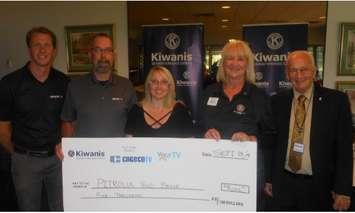 Christmas for Everyone donation. (L to R) Kevin Smith & Scott Honke, Belfor representatives, along with Sandra Hartman, Petrolia Food Bank Coordinator, Donna Kelso, Kiwanis Lt. Governor, and Tom Booth, President Seaway Kiwanis Club. Submitted photo.