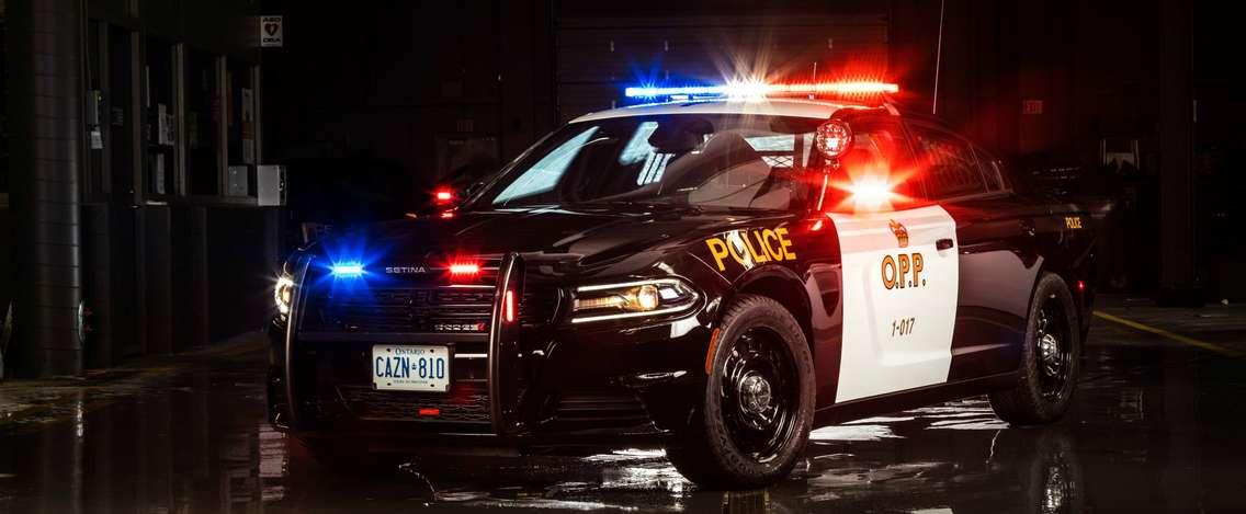 OPP cruiser with lights flashing. (Photo courtesy of @OPP_Hire via Twitter)