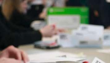 Students at St. Patrick's High School participate in a mock vote. File photo courtesy of St. Pat's photography students. 