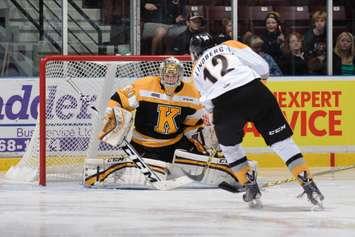Brandon Lindberg is stopped by Lucas Peressini. Photo by Metcalfe Photography.