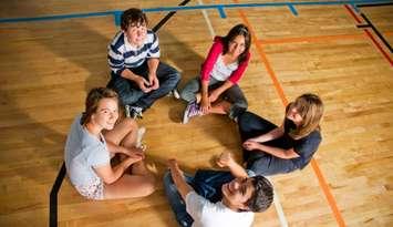 Students collaborate. Photo by stacey_newman / iStock / Getty Images Plus via Getty Images