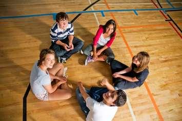 Students collaborate. Photo by stacey_newman / iStock / Getty Images Plus via Getty Images