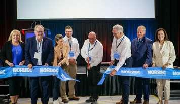 Local dignitaries help cut the ribbon at the official opening of the new Norbec manufacturing plant in Strathroy. Image courtesy of the Municipality of Strathroy-Caradoc.