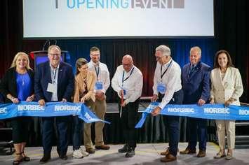 Local dignitaries help cut the ribbon at the official opening of the new Norbec manufacturing plant in Strathroy. Image courtesy of the Municipality of Strathroy-Caradoc.