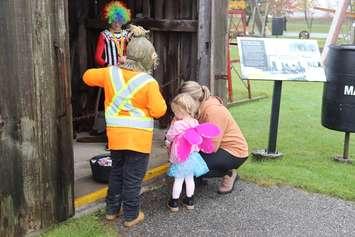 Costumed children trick-or-treating at historic buildings at the Oil Museum in 2023. (Photo courtesy of the County of Lambton)