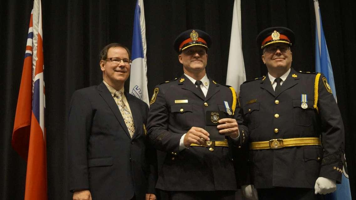 Michael Van Sickle receiving his Deputy Chief of Police badge (Photo by: Lindsay Newman)