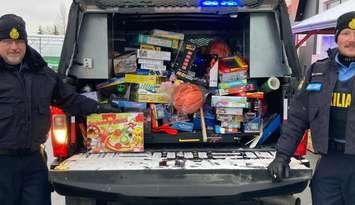 Lambton OPP at Christmas for Everyone’ Food & Toy Drive. Photo courtesy of West Region OPP via X. 