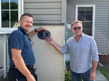 Chair of the Sarnia Heritage Committee Robert Dickieson and homeowner Kelly Bell at the home on 378 East Street North (Photo by: Lindsay Newman/ Blackburn Media)