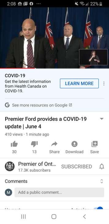 Jamil Jivani, Ontario Advocate for Community Opportunities, speaks to media at Queens Park in Toronto, as Premier Doug Ford listens, June 4, 2020. Photo by Premier of Ontario/YouTube.