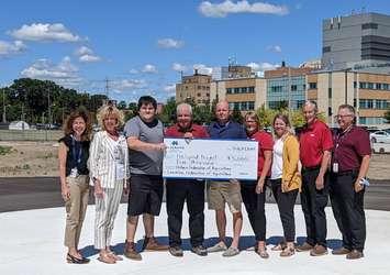 The Lambton and Ontario Federations of Agriculture present Bluewater Health with $5,000 toward construction of the new helipad. July 29, 2022 photo by Natalia Vega.