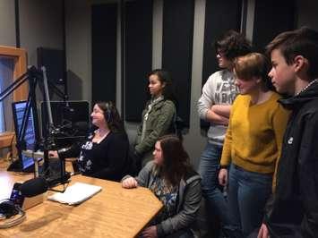 Grade 9 students join Stephanie Chaves for a newscast during Take Our Kids To Work Day. BlackburnNews photo by Dave Dentinger.