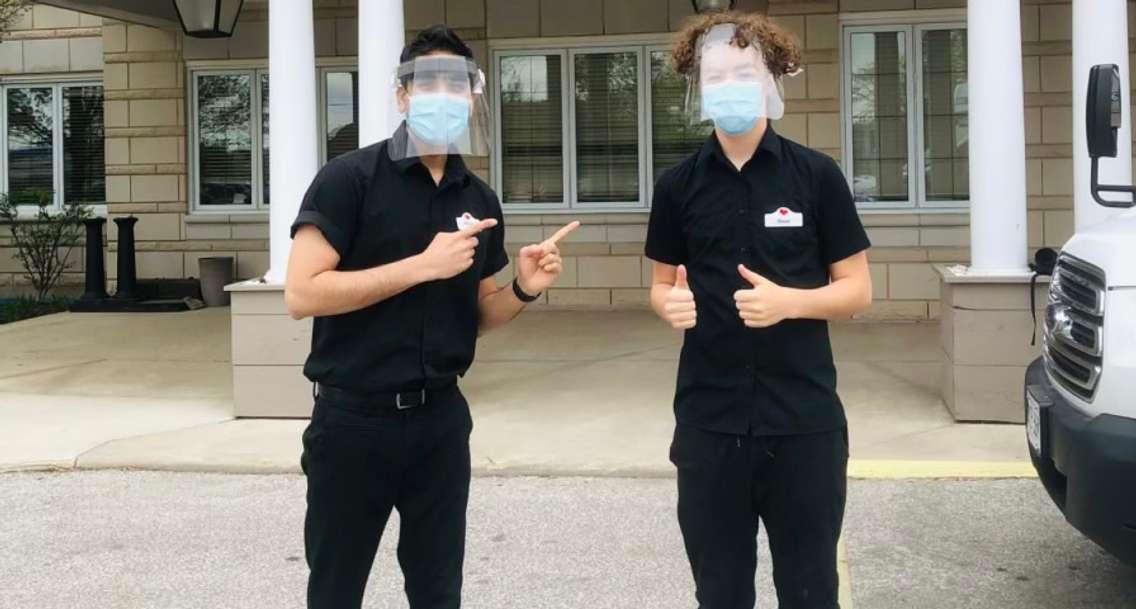 Oscar Allen (right) stands outside Sarnia's Landmark Village with Manager Ankush Sharma (left) who helped him book his COVID-19 vaccination. May 6, 2021 Submitted photo.