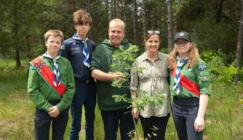 Lambton-Kent-Middlesex MPP Steve Pinsonneault, and Minister of the Environment, Conservation and Parks Andrea Khanjin pose with members of Scouts Canada at Camp Attawandaron (Submitted photo)
