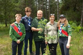 Lambton-Kent-Middlesex MPP Steve Pinsonneault, and Minister of the Environment, Conservation and Parks Andrea Khanjin pose with members of Scouts Canada at Camp Attawandaron (Submitted photo)