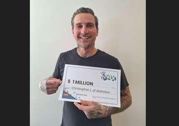 Christopher Lucas of Alvinston claims $1 Million Lotto Max prize. Image courtesy of OLG.