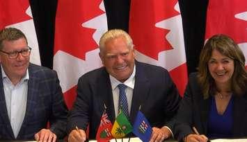 (Photo of Saskatchewan Premier Scott Moe, Ontario Premier Doug Ford, and Alberta Premier Danielle Smith via YouTube Livestream