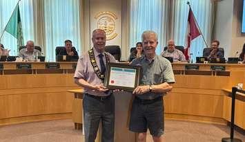 Petrolia Town Crier Les Whiting receives Senior of the Year award. June 24, 2025. (Photo courtesy of the Town of Petrolia via Facebook)
