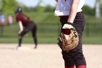 Softball players on the field. © Can Stock Photo / pklick360