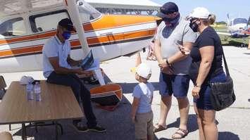 Four-year-old Andrew of Port Lambton was very excited to meet Chris Hadfield at the fly-in event. August 14, 2021. (Photo by Natalia Vega)