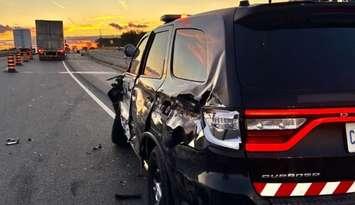 An OPP cruiser struck by a transport truck on Hwy. 402 (Photo via OPP West Region on X)