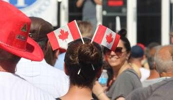 A woman dressed for Canada Day celebrations. (File photo by Adelle Loiselle)