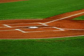 Home plate on a baseball diamond. © Can Stock Photo / zimmytws