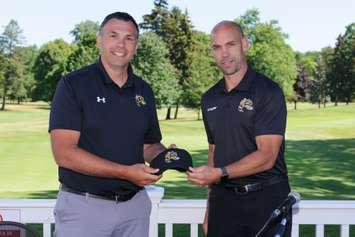 Sarnia Sting GM Dylan Seca (left) introducing Alan Letang (right) as the new head coach of the hockey club.  22 June 2021. 
 (Courtesy of Metcalfe Photography)