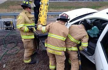 Single vehicle crash at Christina St. 402 on-ramp April 21, 2016 (Photo courtesy of Sarnia fire service via Twitter)