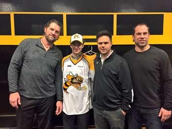From L to R, Sarnia Sting co-owner and head coach Derian Hatcher, 2017 first round draft pick Jamieson Rees, Sting general manager Nick Sinclair and co-owner David Legwand.  Rees was the ninth overall pick in the 2017 OHL Priority Selection. (Photo courtesy of Sarnia Sting Twitter account)