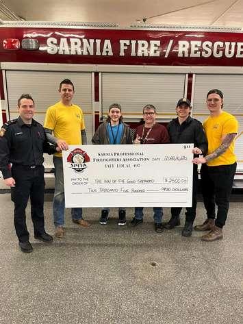 Donation to The Inn of the Good Shepherd. December 20, 2022. (Photo courtesy of the Sarnia Professional Firefighters Association via Twitter)