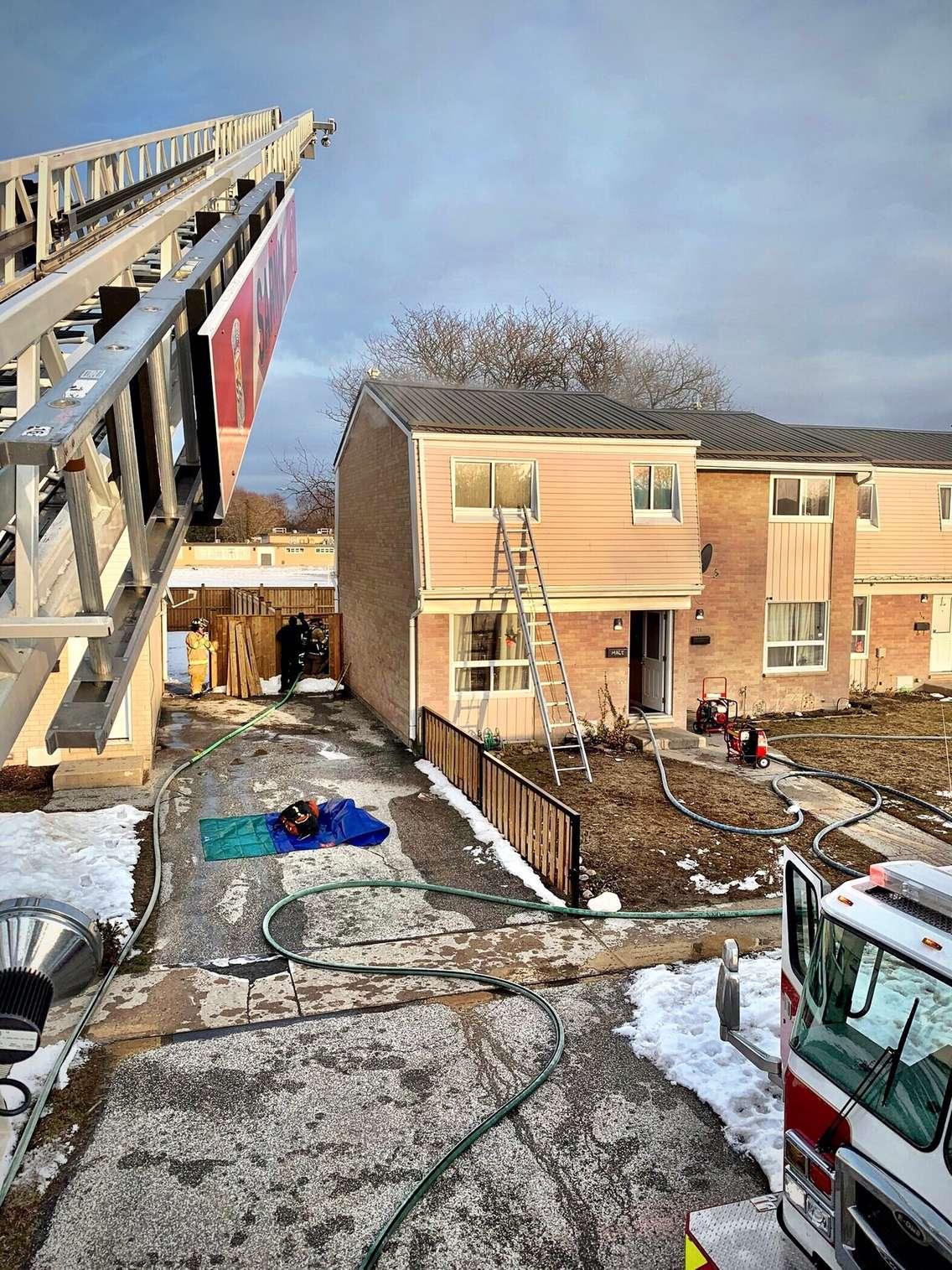 Sarnia firefighters put out a blaze at a townhome on Roger Street. March 01, 2023. Photo via @SarniaFire on Twitter.