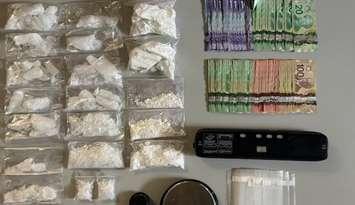 Sarnia police seized drugs, cash, and drug trafficking paraphernalia during a recent investigation. July 15, 2025. (Photo courtesy of the Sarnia Police Service)