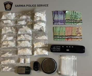 Sarnia police seized drugs, cash, and drug trafficking paraphernalia during a recent investigation. July 15, 2025. (Photo courtesy of the Sarnia Police Service)