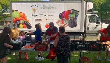 Distribution at one of The Inn of the Good Shepherd's Mobile Market stops in 2025. Submitted photo.