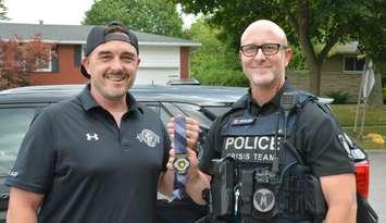 Sarnia police and the rugby club with the medals (Photo by: Sarnia police)