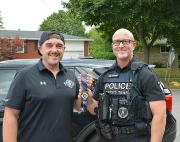 Sarnia police and the rugby club with the medals (Photo by: Sarnia police)