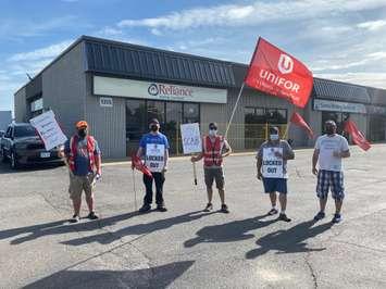 Workers locked out at Reliance Home Comfort on Confederation Street in Sarnia. (From left to right) Plumber Shawn Thomson, Senior Installer Kyle Eades, HVAC Technician Tim Terpstra, HVAC Service Technician Leland Lockrey and Water Heater Installer Dan Douglas. May 19, 2021 Photo by Melanie Irwin