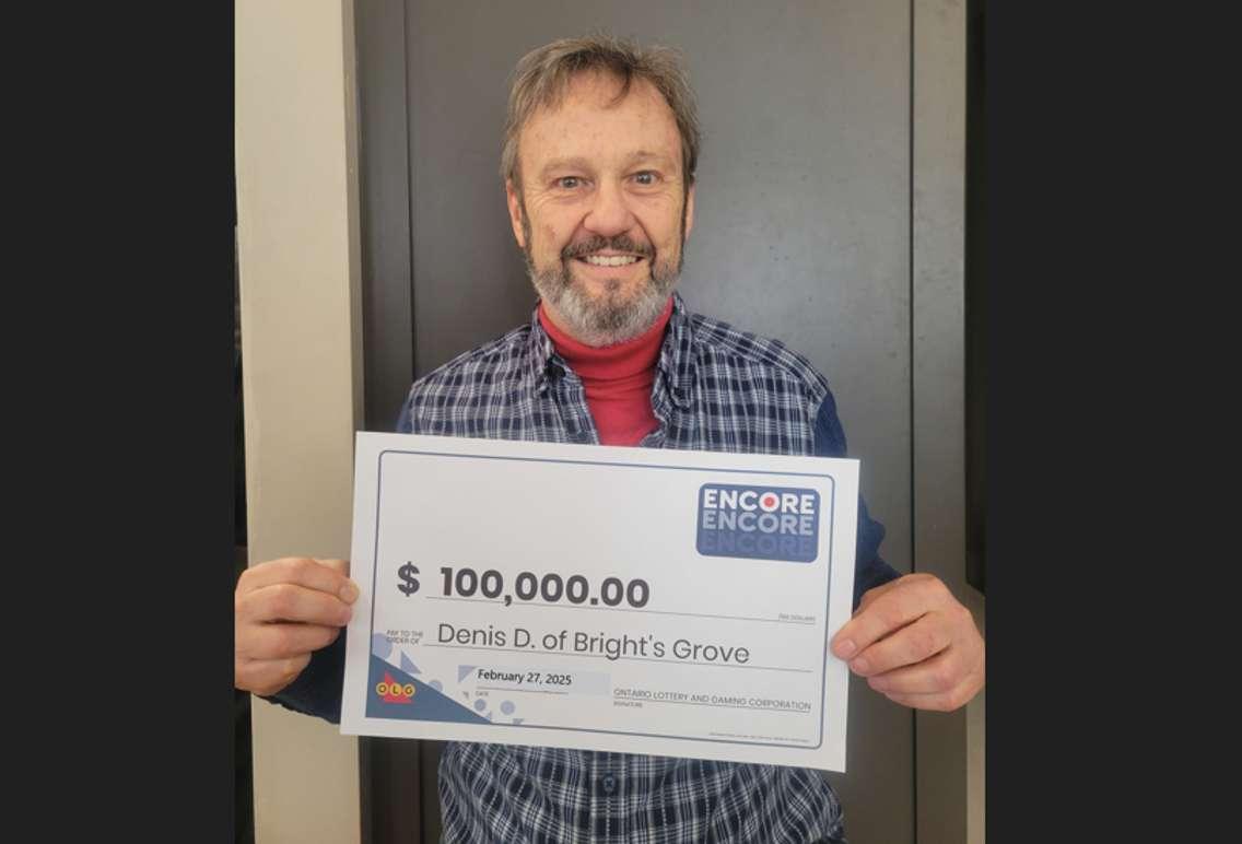 Denis Drapeau of Bright's Grove shows off his winning ENCORE prize cheque. Submitted.