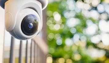 Photo of security camera by oatintro via iStock / Getty Images Plus