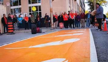 UNDRIP Committee unveiled a new Residential Schools Memorial Crosswalk at the corner of Front Street and Lochiel Street. September 30, 2022. (Photo courtesy of the City of Sarnia)
